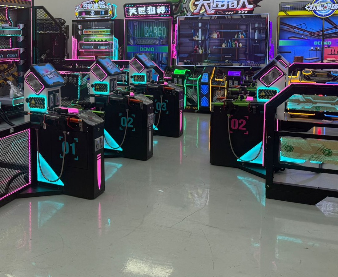 A row of light-gun shooting arcade stations at a Playdia venue